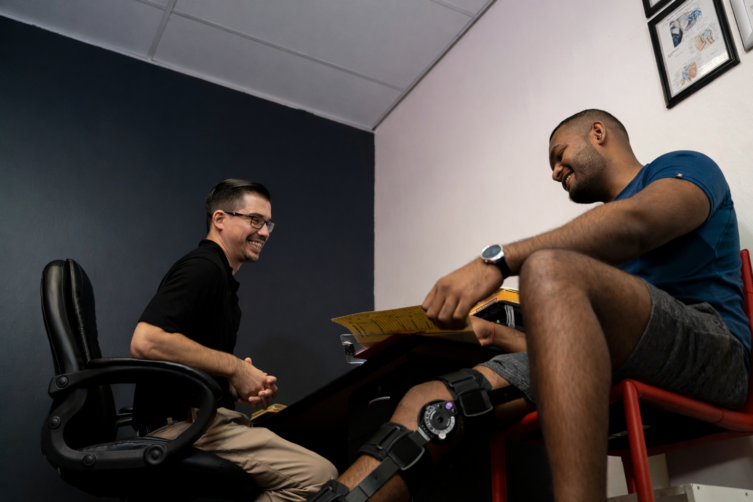 Kobus Olivier biokineticist consulting with a patient at his Westville practice